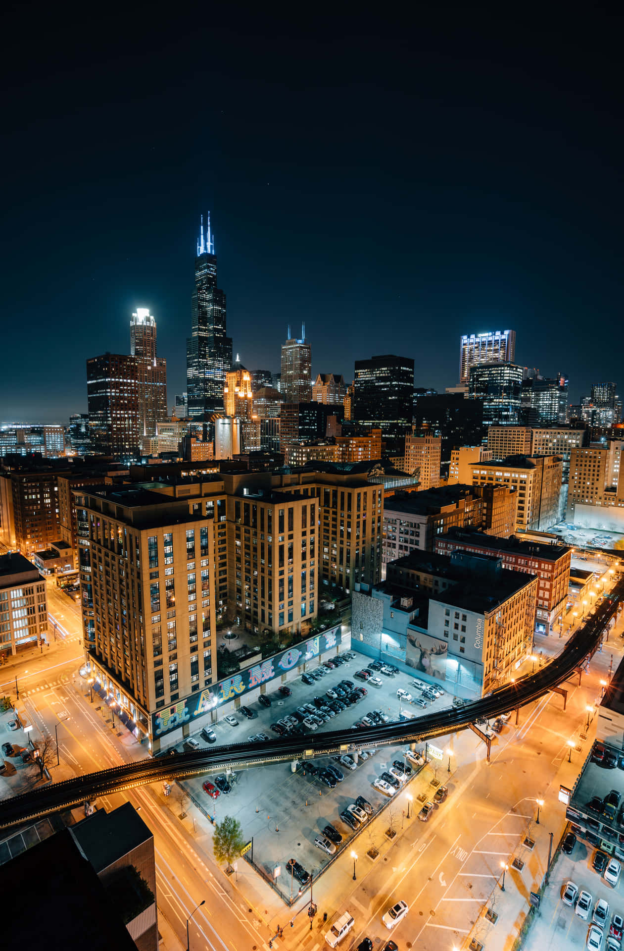 Vivil'esperienza Della Vivace Città Di Chicago Di Notte. Sfondo