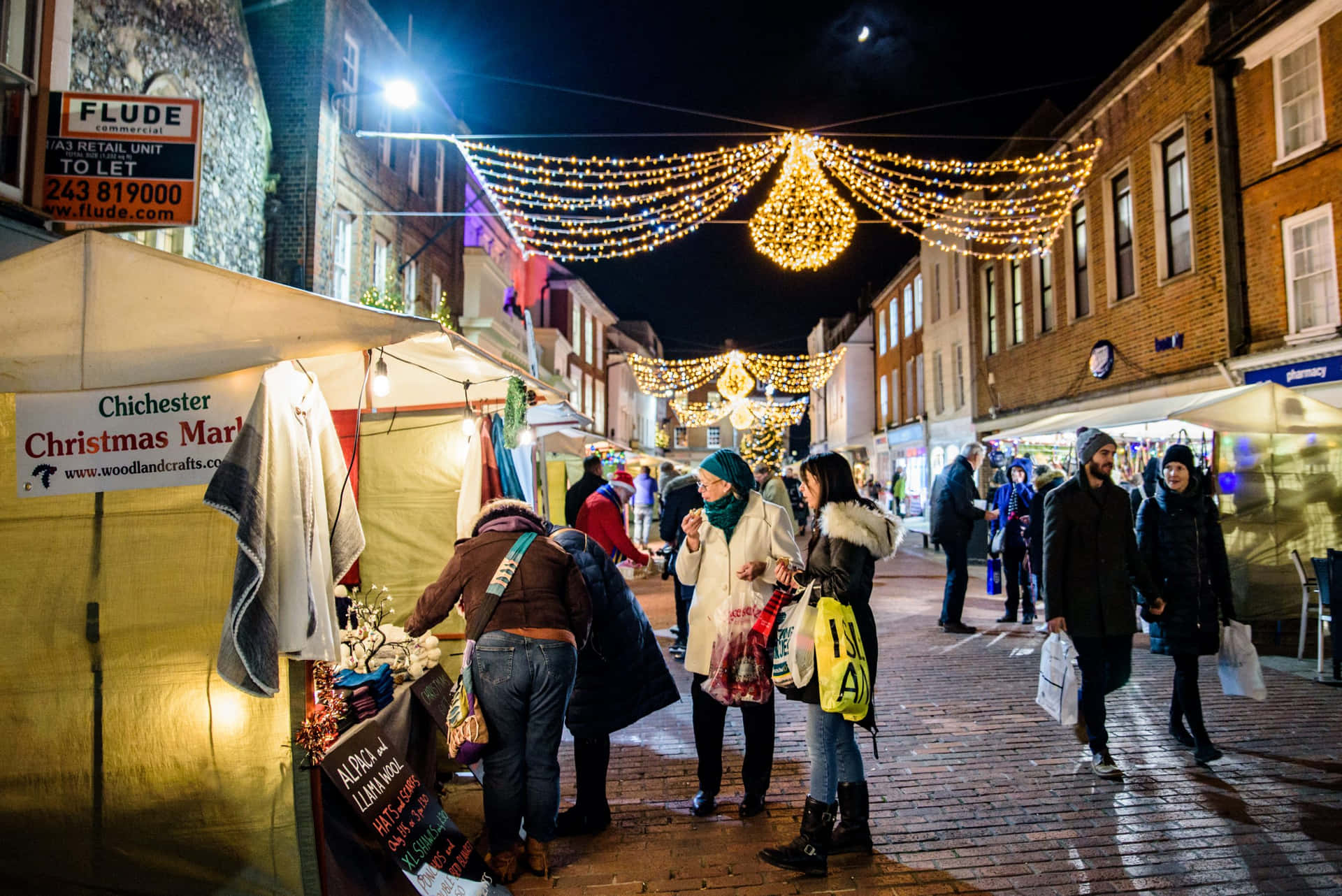 Chichester Christmas Market Night Scene Wallpaper