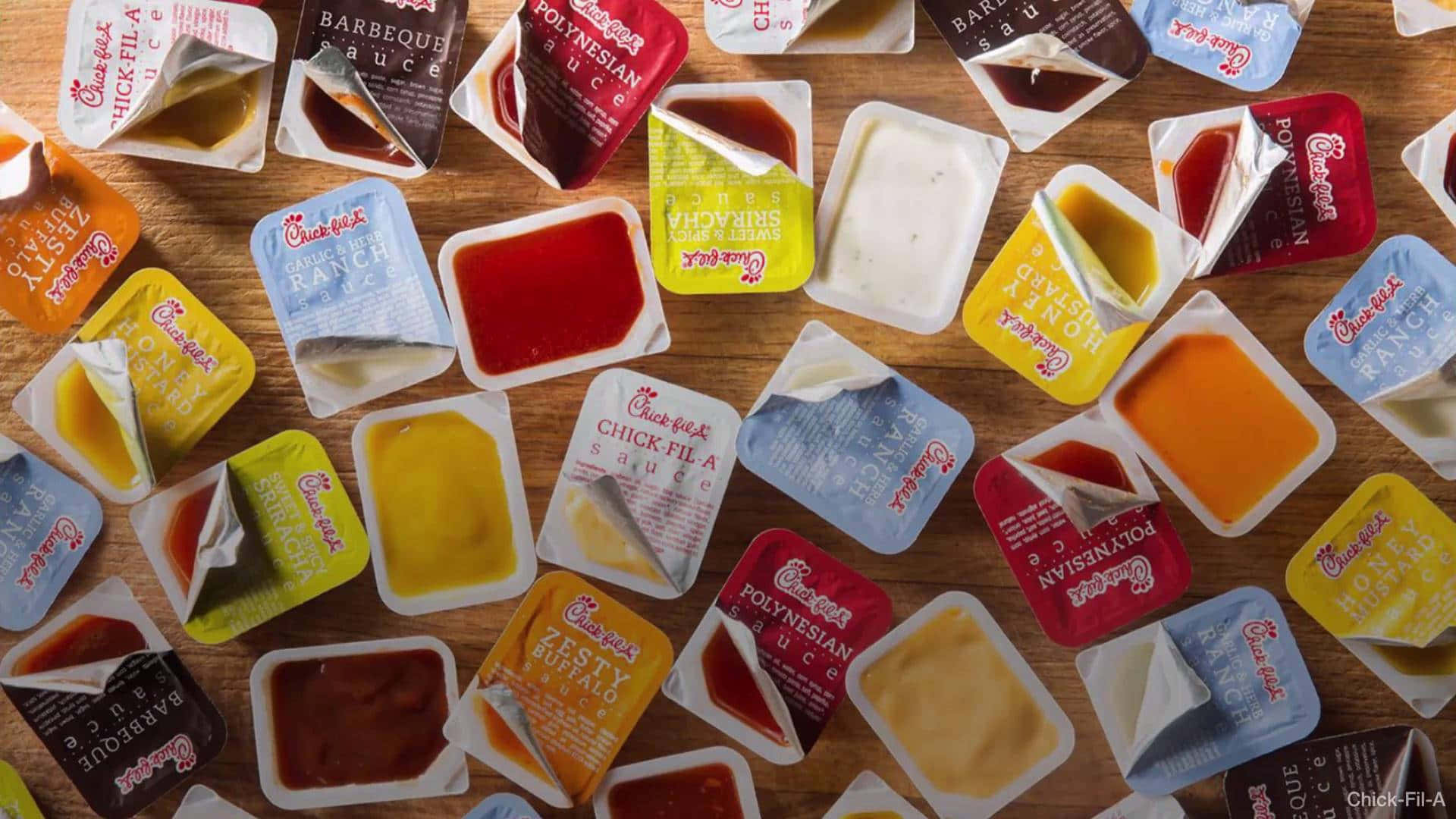 A Table With Many Different Kinds Of Sauces