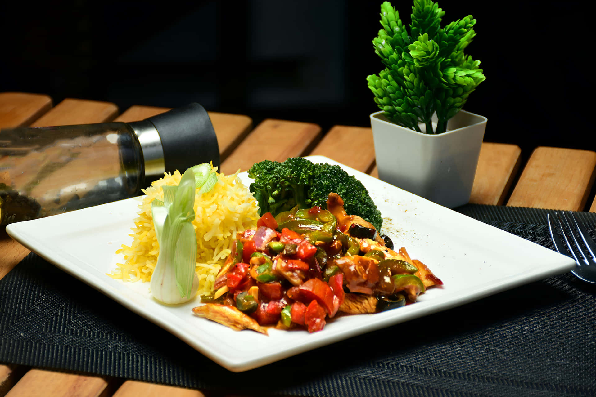 Chicken Chilli Dry With Rice On A Plate Wallpaper