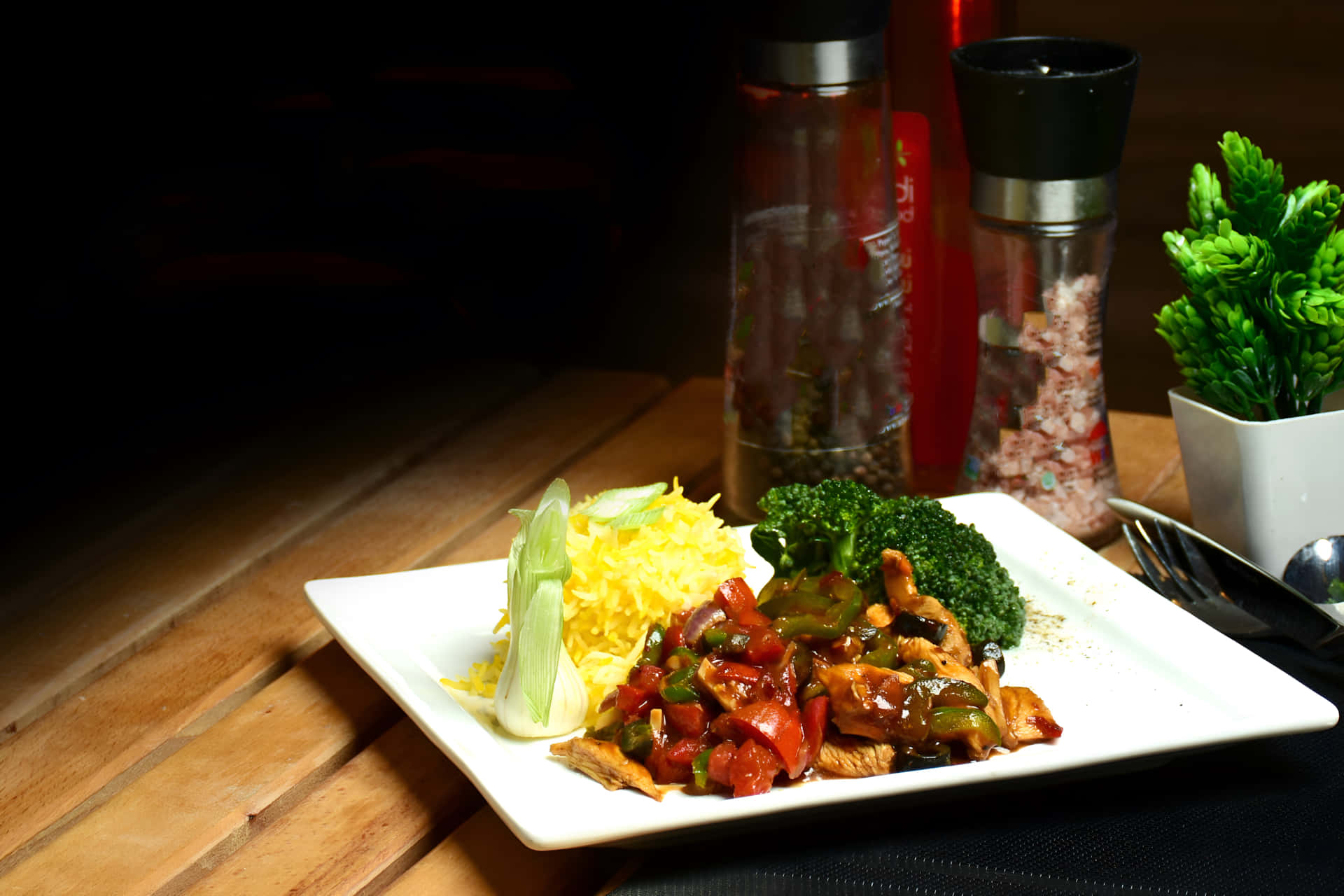 Chicken Chilli Dry With Rice On A Plate Wallpaper