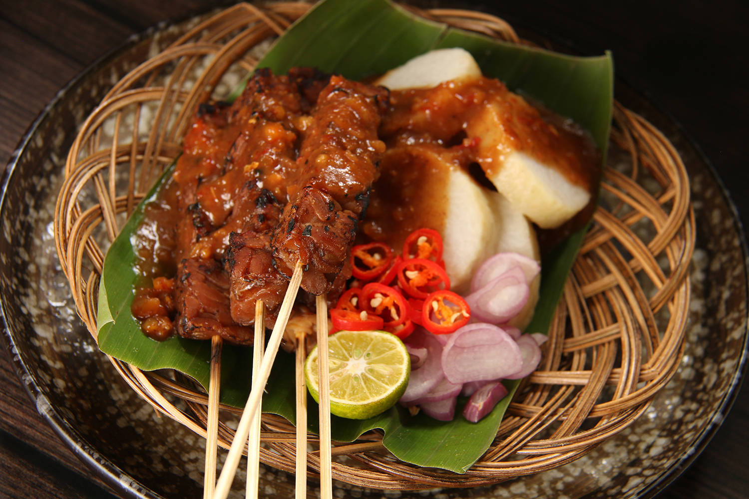 Chicken Satay Southeast Asian Dish On Rattan Platter Wallpaper