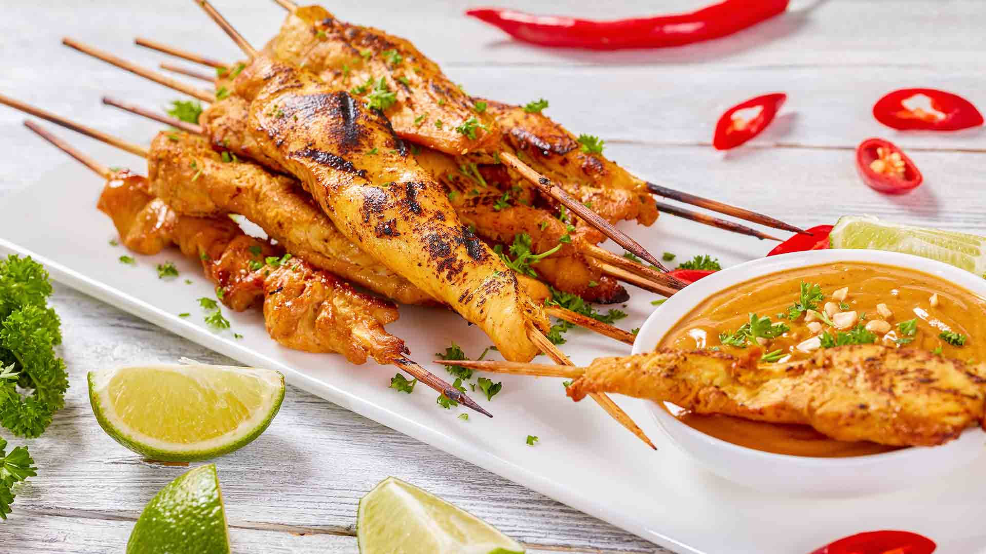 Savory Chicken Satay with Tangy Lemon and Spicy Red Chili Wallpaper