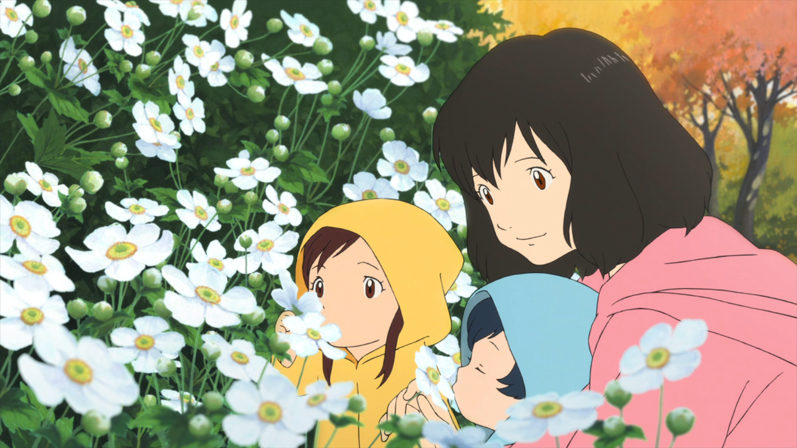 A Woman And Child Are In A Field Of Flowers