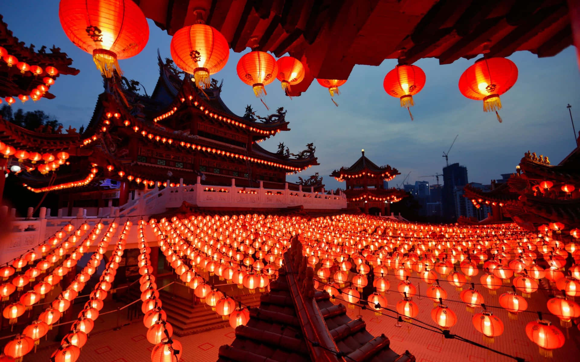 Chinese paper lanterns hanging from a bridge