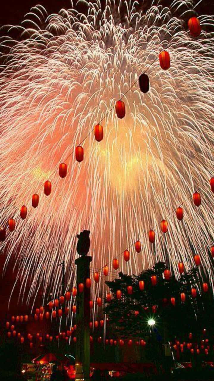 Vibrant Street Fireworks Celebrating Chinese New Year 2022 Wallpaper
