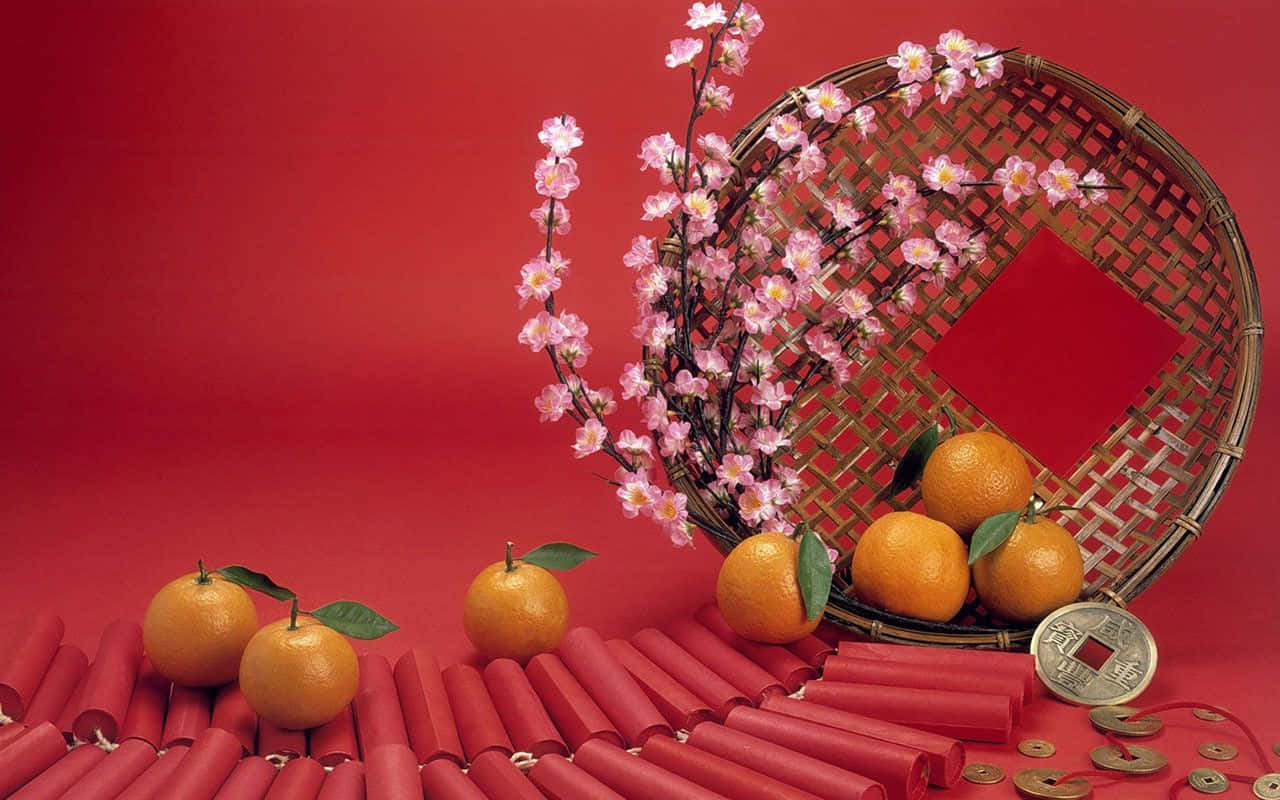 A Basket With Oranges And A Red Background