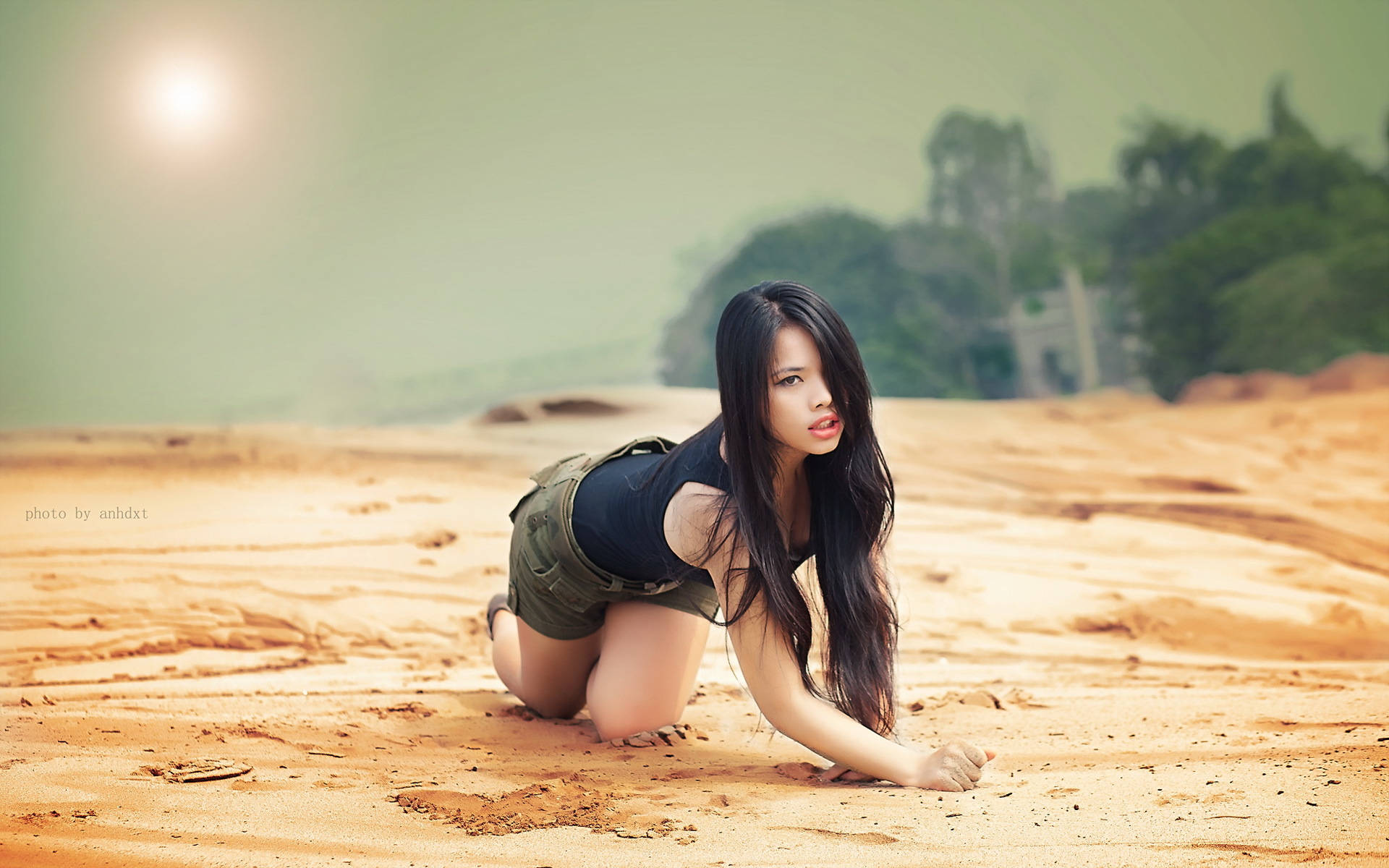 Chinese Woman Posing On Beach Wallpaper