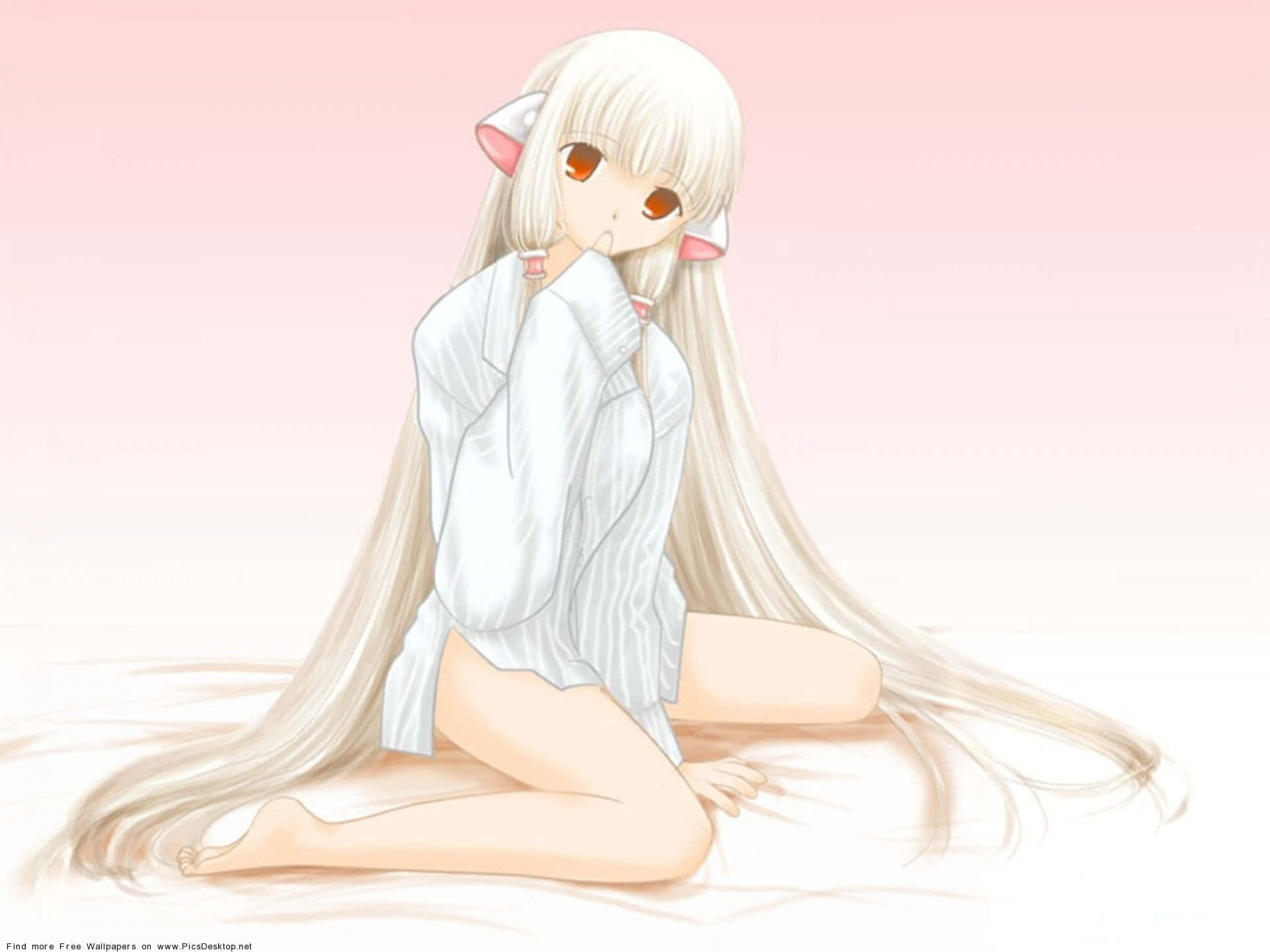 A Girl With Long Hair Sitting On A Bed
