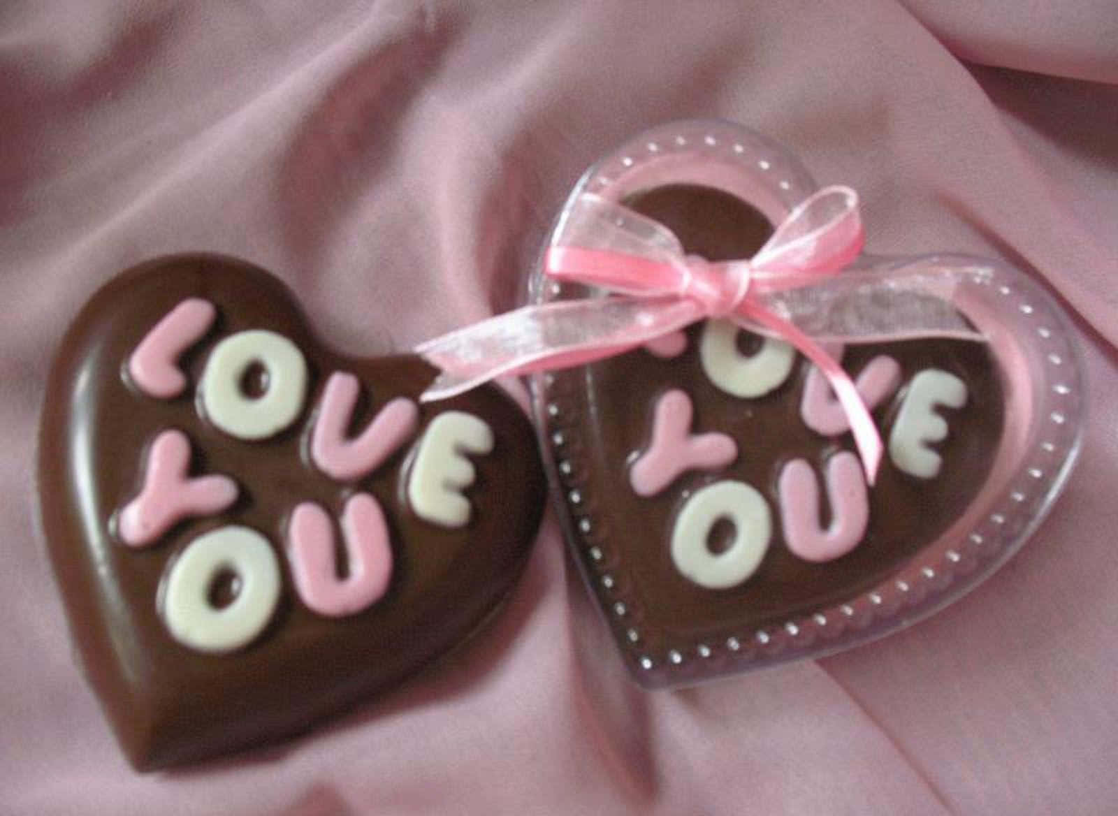 Chocolate Heart Shaped Chocolates With Love You Written On Them