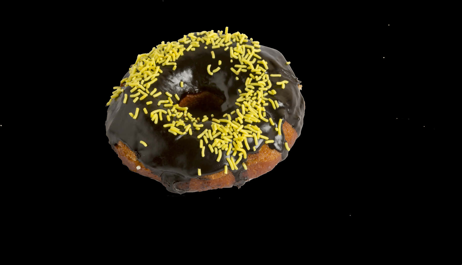 Chocolate Sprinkled Donut Black Background.jpg PNG