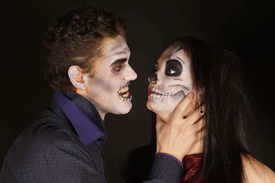 Man Choking A Woman With Face Paint Wallpaper
