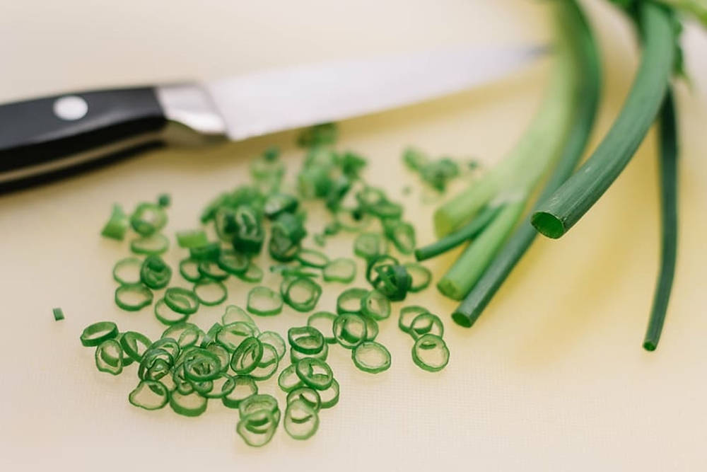 Chopped Spring Onion With Knife Wallpaper