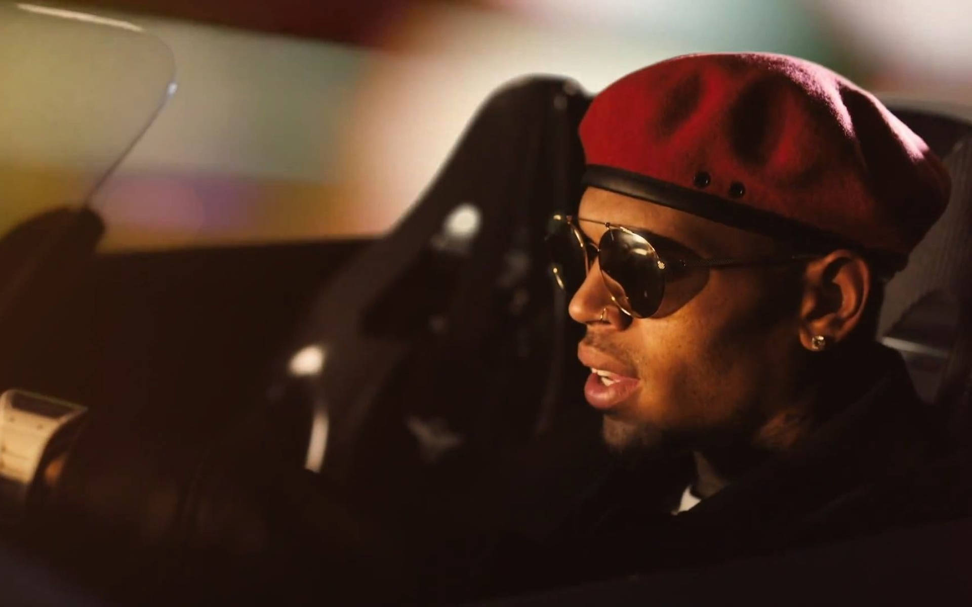 Chris Brown Driving Car Background