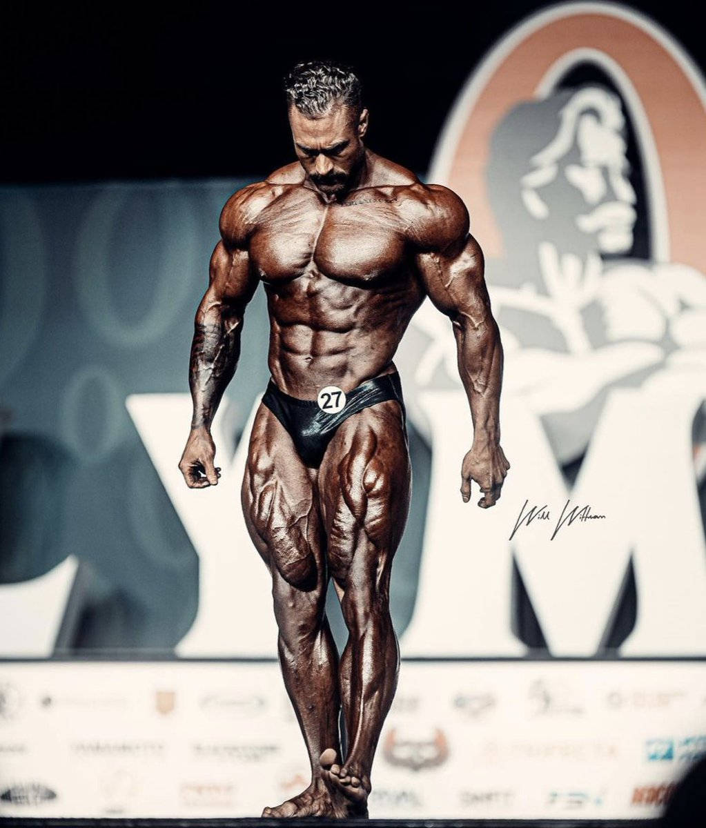 Chris Bumstead Looking Down On Stage Wallpaper