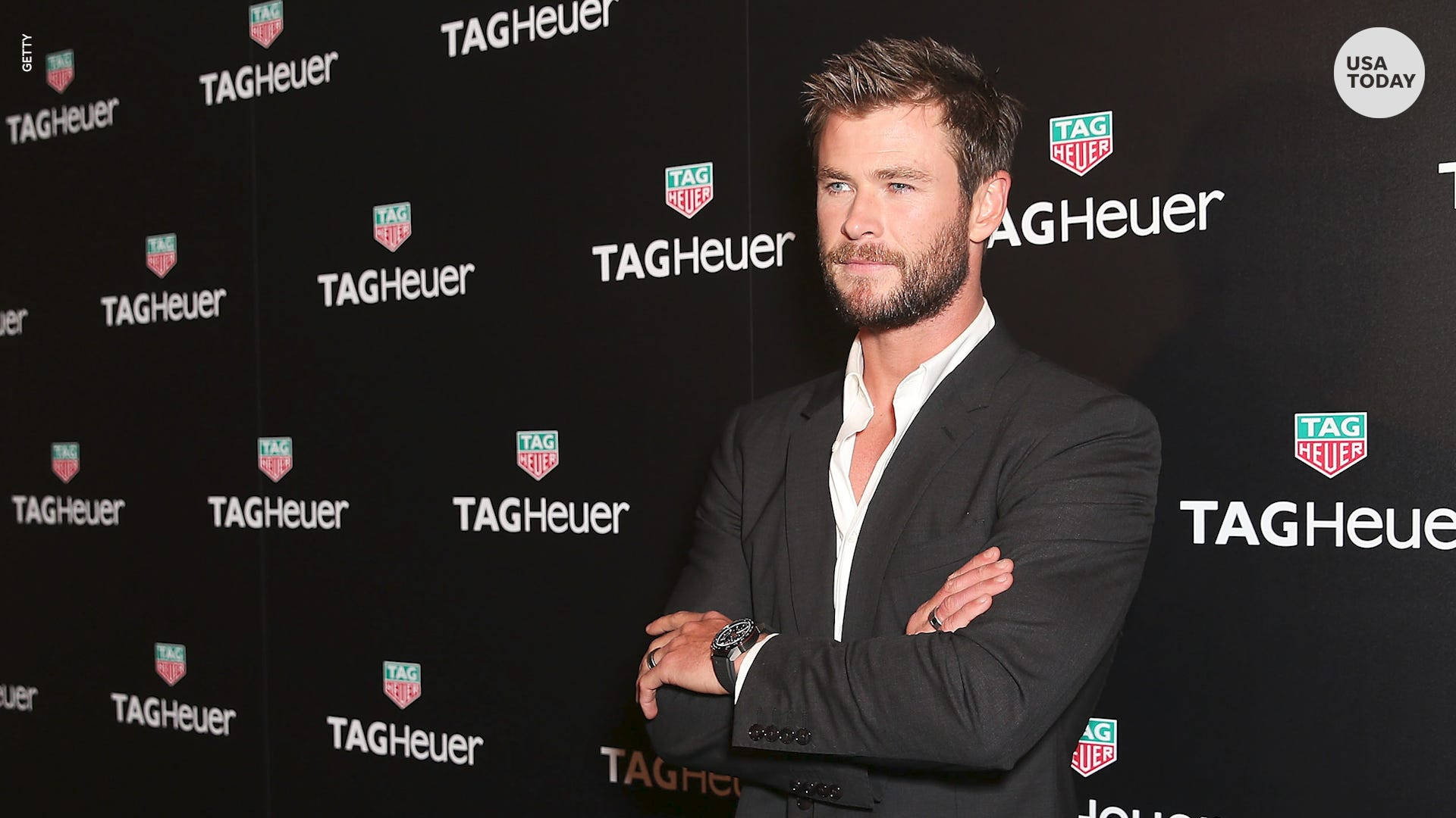Chris Hemsworth In Red Carpet Background