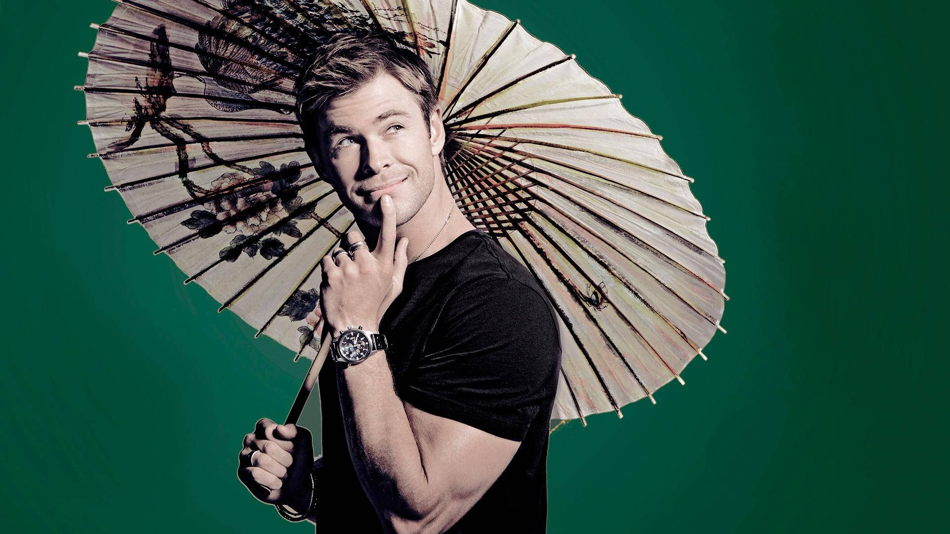 Image  Chris Hemsworth with an Umbrella Wallpaper