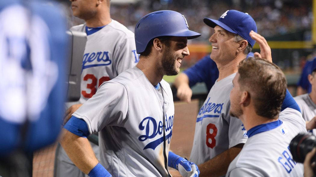 Chris Taylor Laughing With Teammates Wallpaper