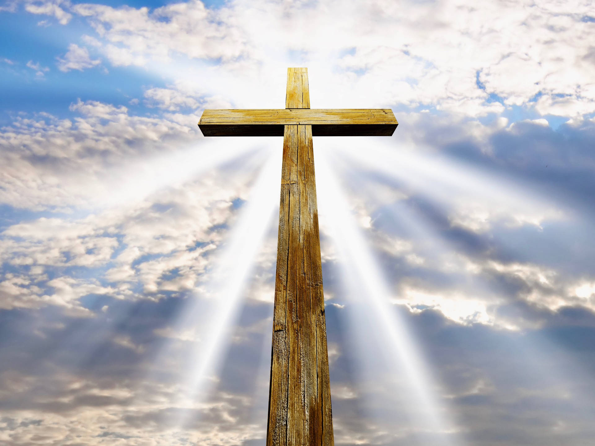 Christian Cross Illuminated By Sun Wallpaper