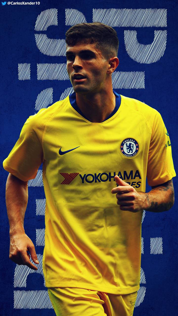 Christian Pulisic In Action During A High-intensity Football Game. Wallpaper