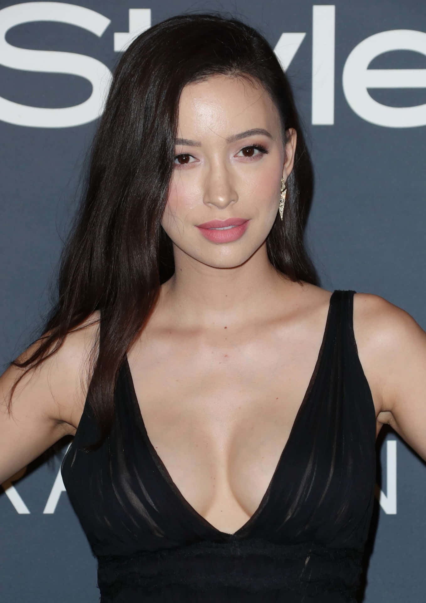 Christian Serratos dazzling in a stylish outfit Wallpaper