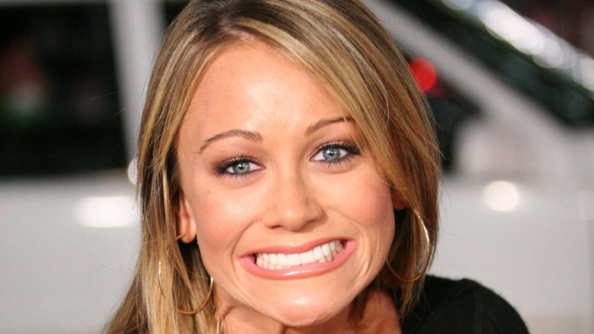 Christine Taylor looking elegant in a photoshoot Wallpaper
