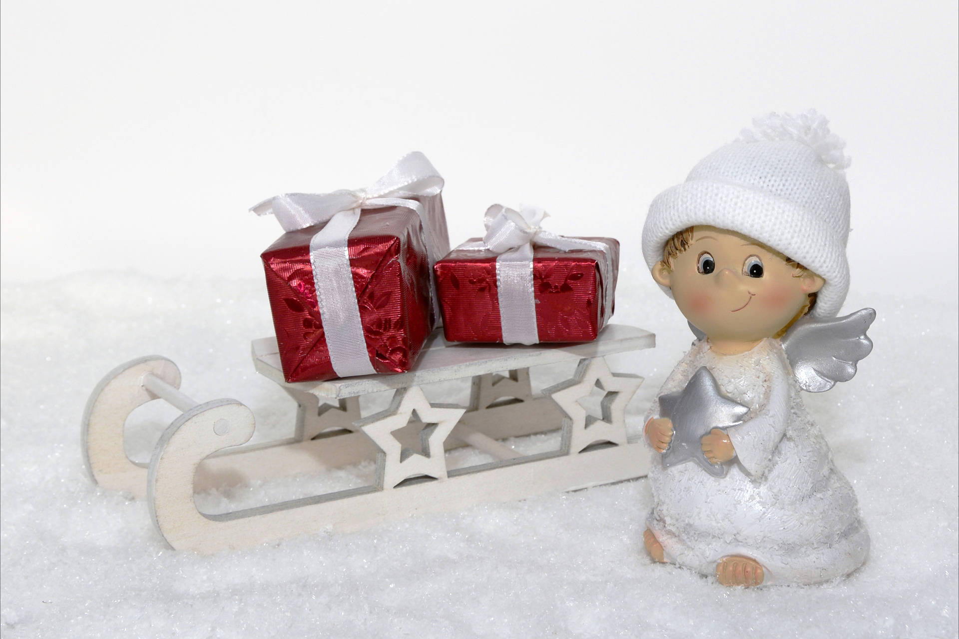Christmas Angel Sled Of Gifts Wallpaper