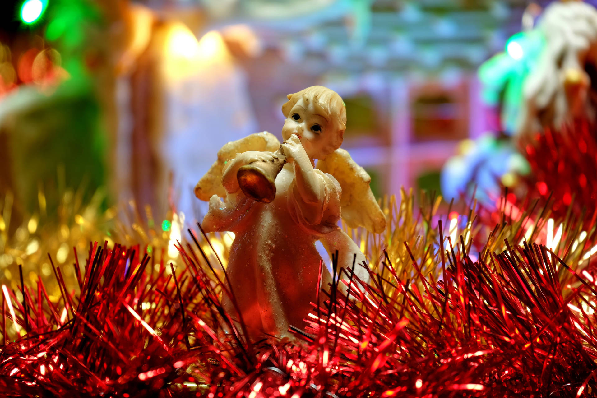 Christmas Angel With Tinsels Wallpaper