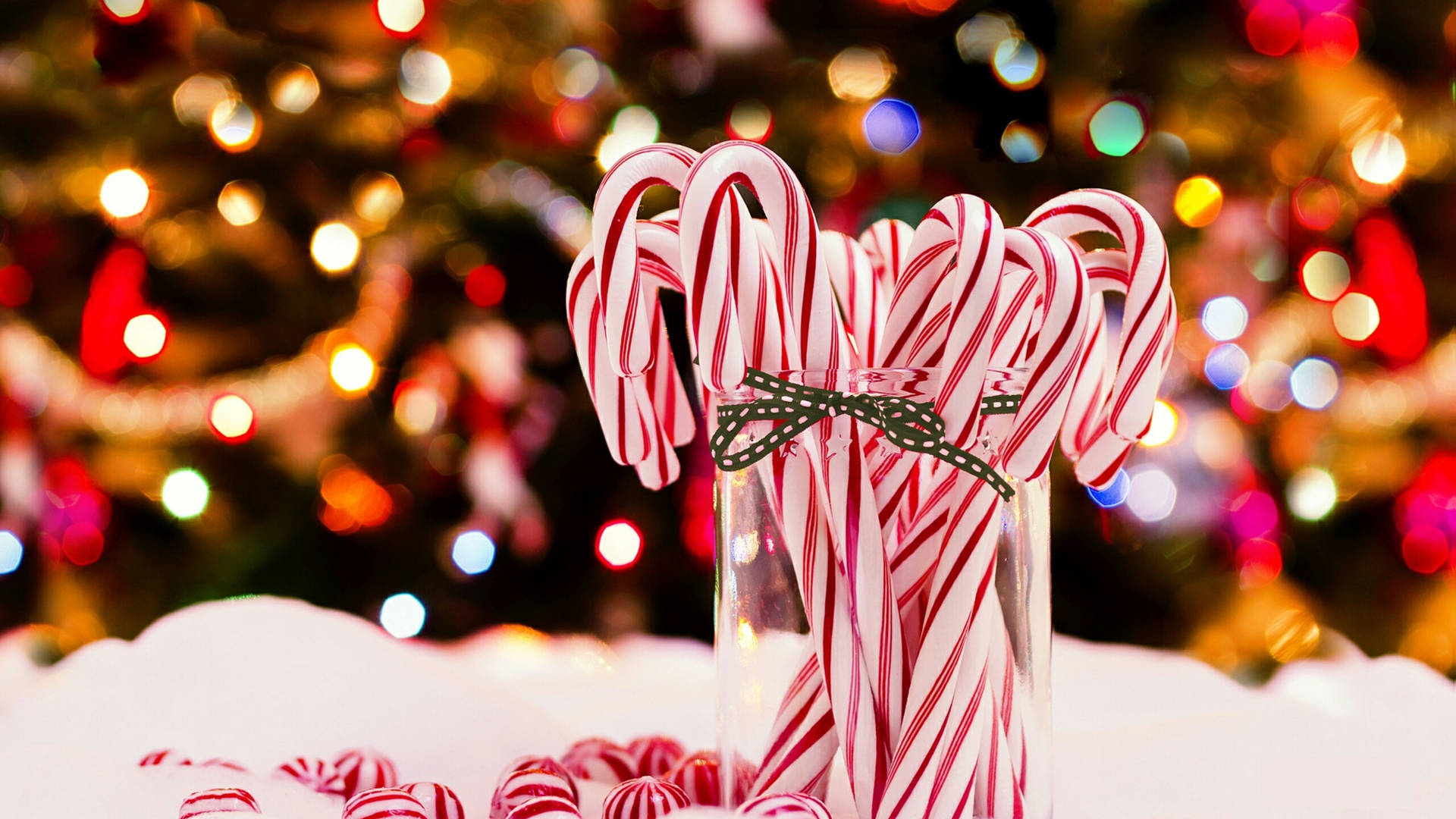 Christmas Candy Canes In Glass Wallpaper