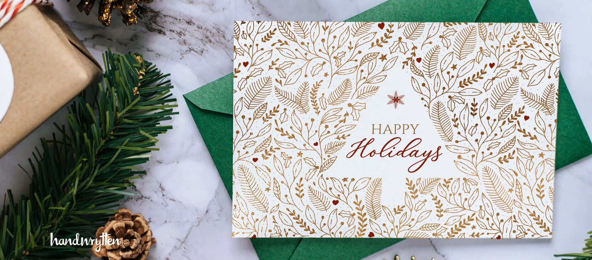 A Christmas Card With A Gold Tree And Green Leaves