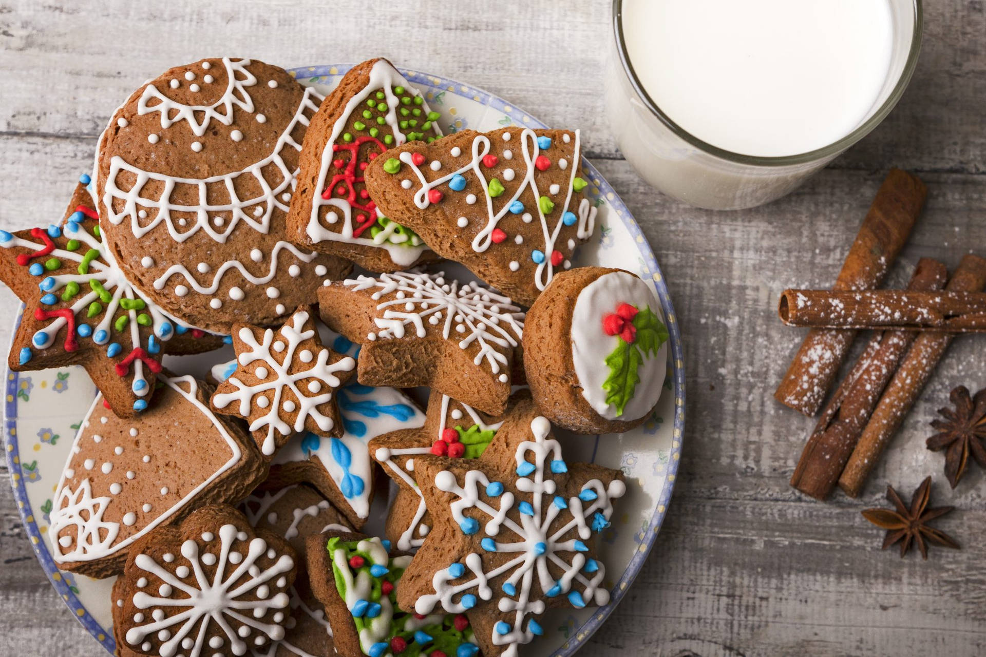 Caption: Delicious Christmas Cookies with Milk and Cinnamon Wallpaper