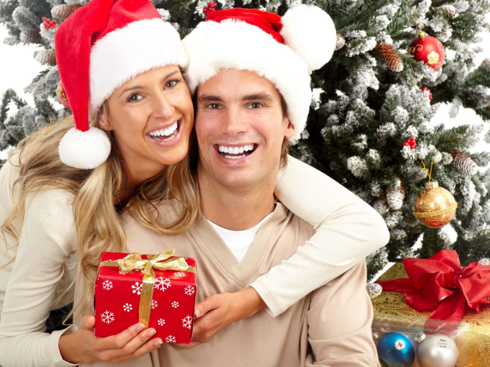 Christmas Couple Smiling Holding Gift Picture