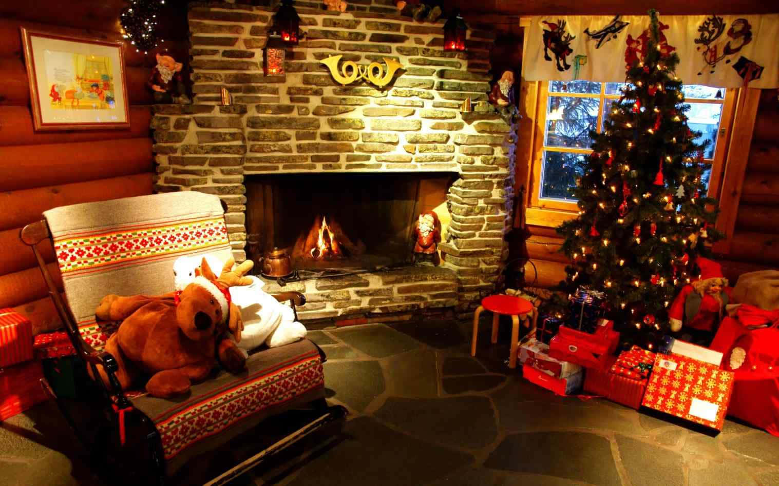 Christmas Fireplace With Reindeer Stuffed Toy Background