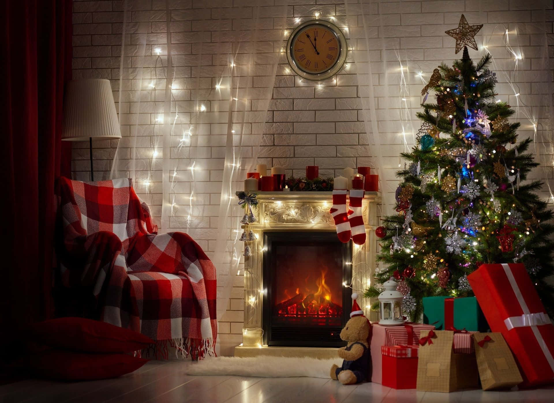 Christmas Fireplace With Tree And Plaid Couch Background