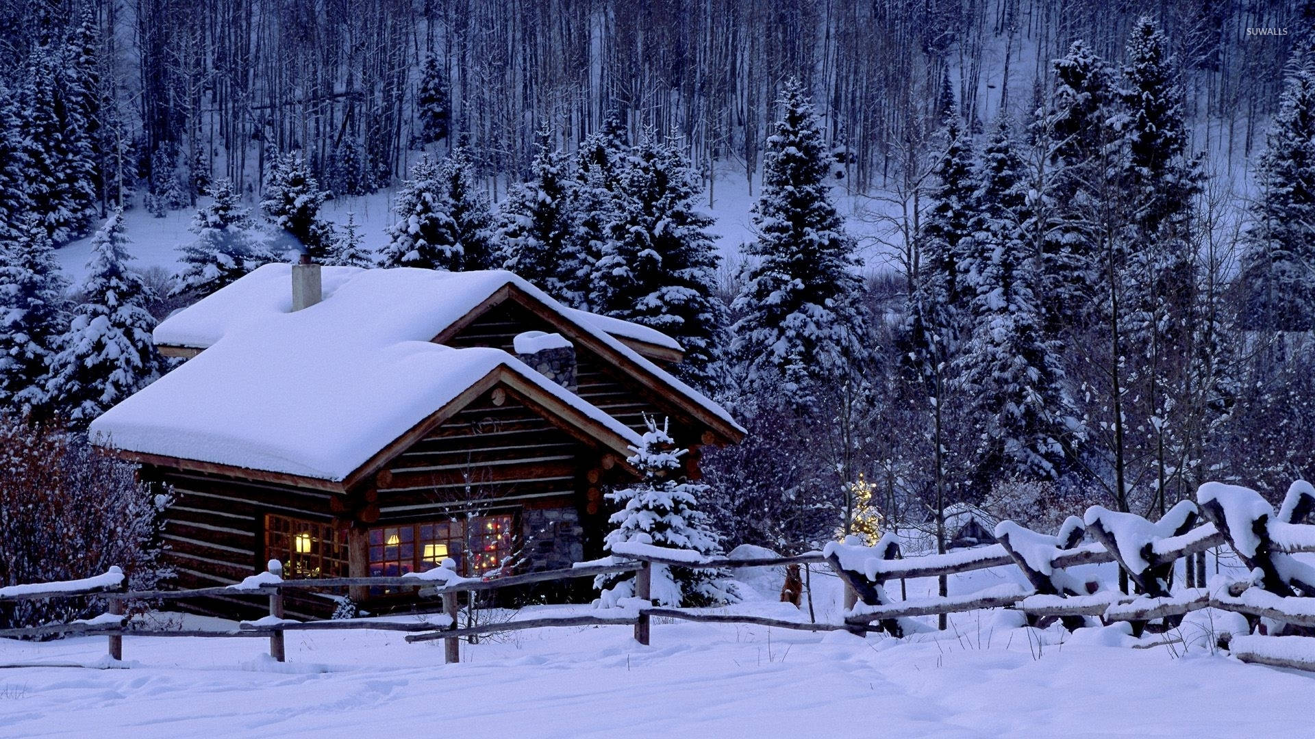 Cabin With Fences In Christmas Forest Wallpaper