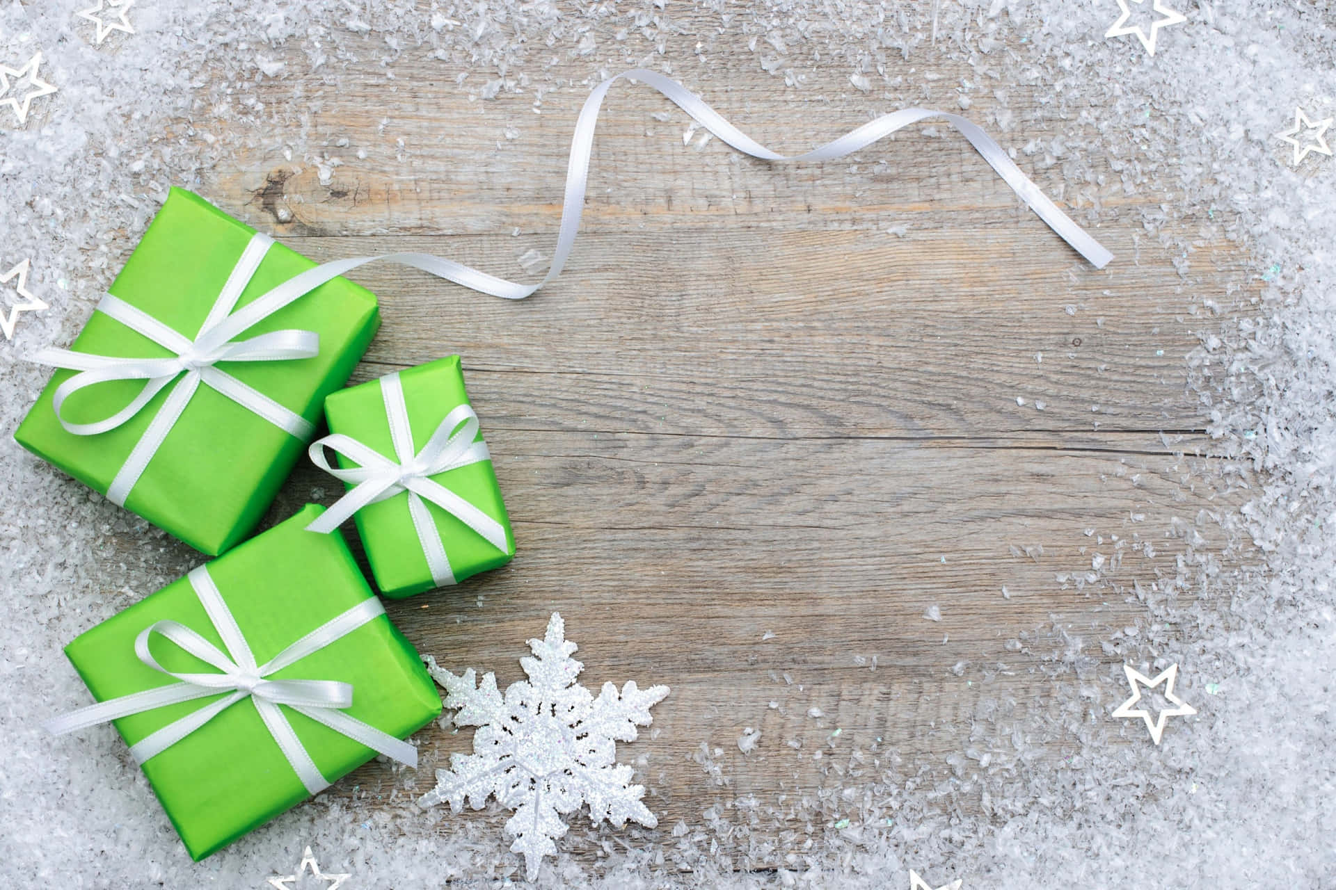 Green Christmas Gifts With Snow Picture