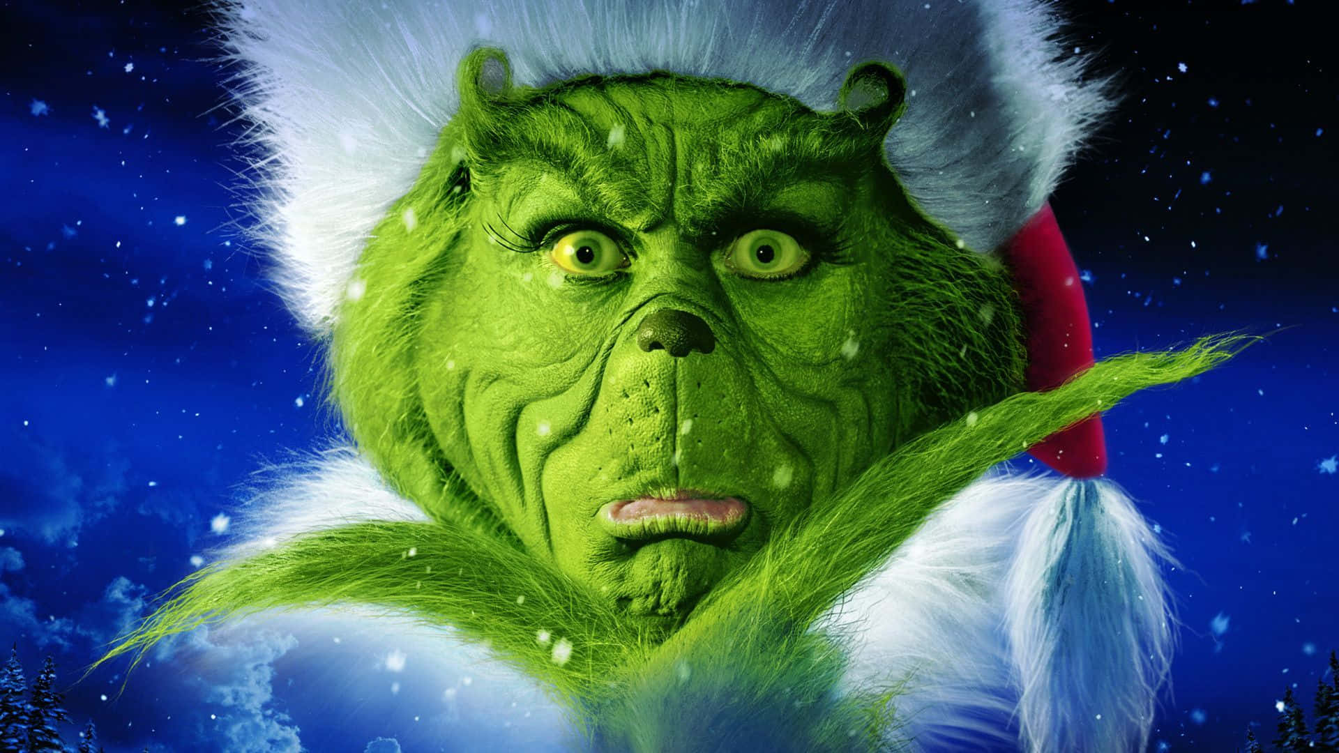 Get into the Christmas spirit with the Grinch! Wallpaper