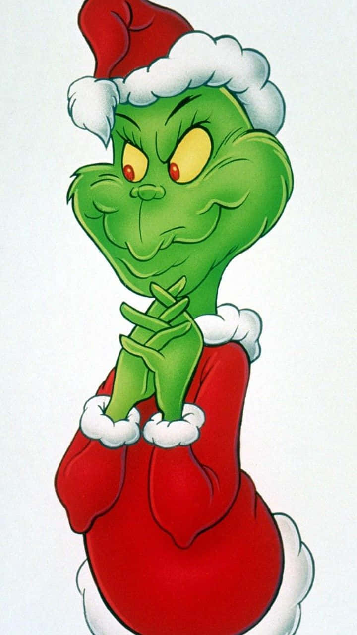 The Grinch Is A Cartoon Character Dressed In Santa Claus Wallpaper