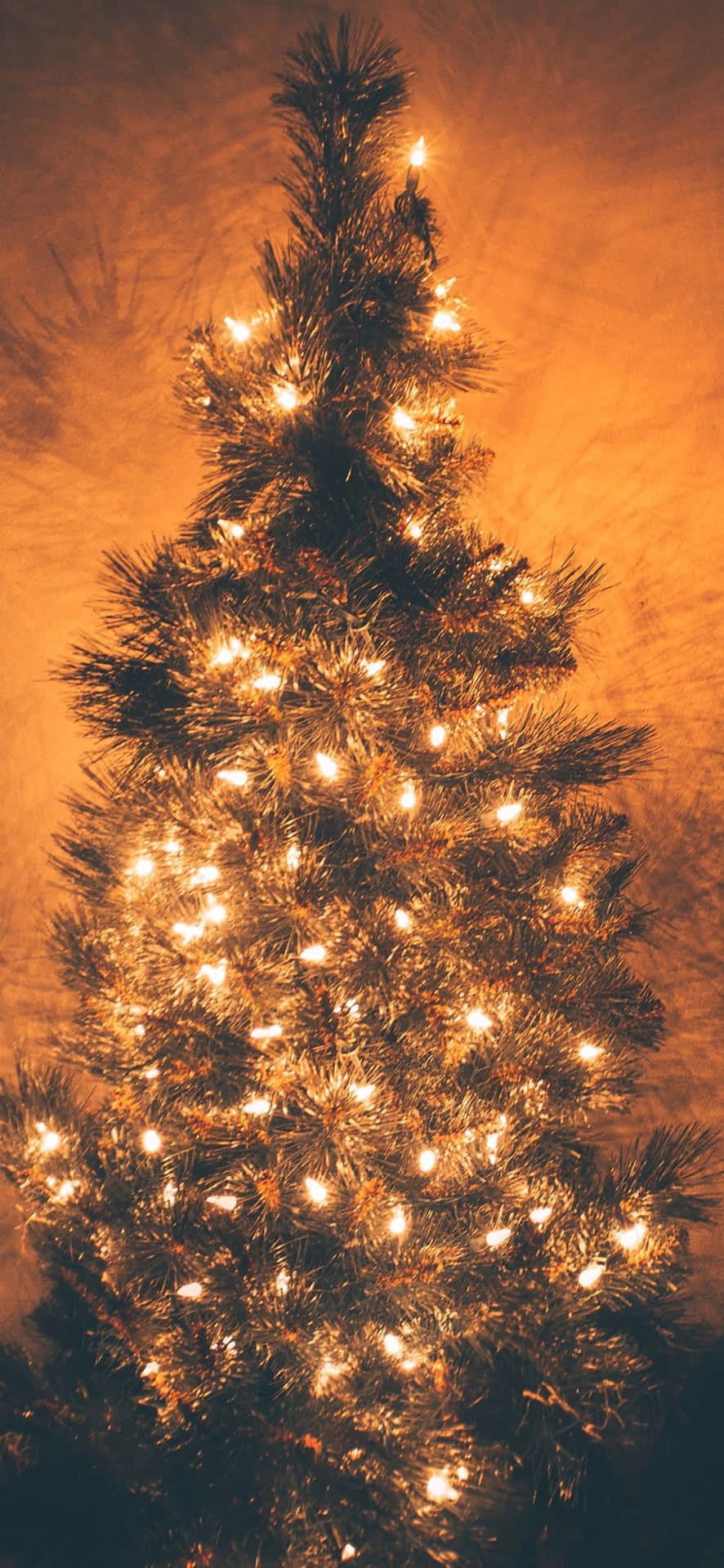 Enjoy a Magical Holiday Season with this Christmas Themed iPhone Wallpaper