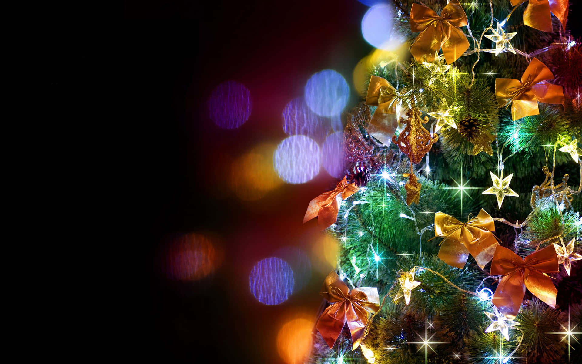 Christmas Light On Tree With Ribbons And Stars Picture