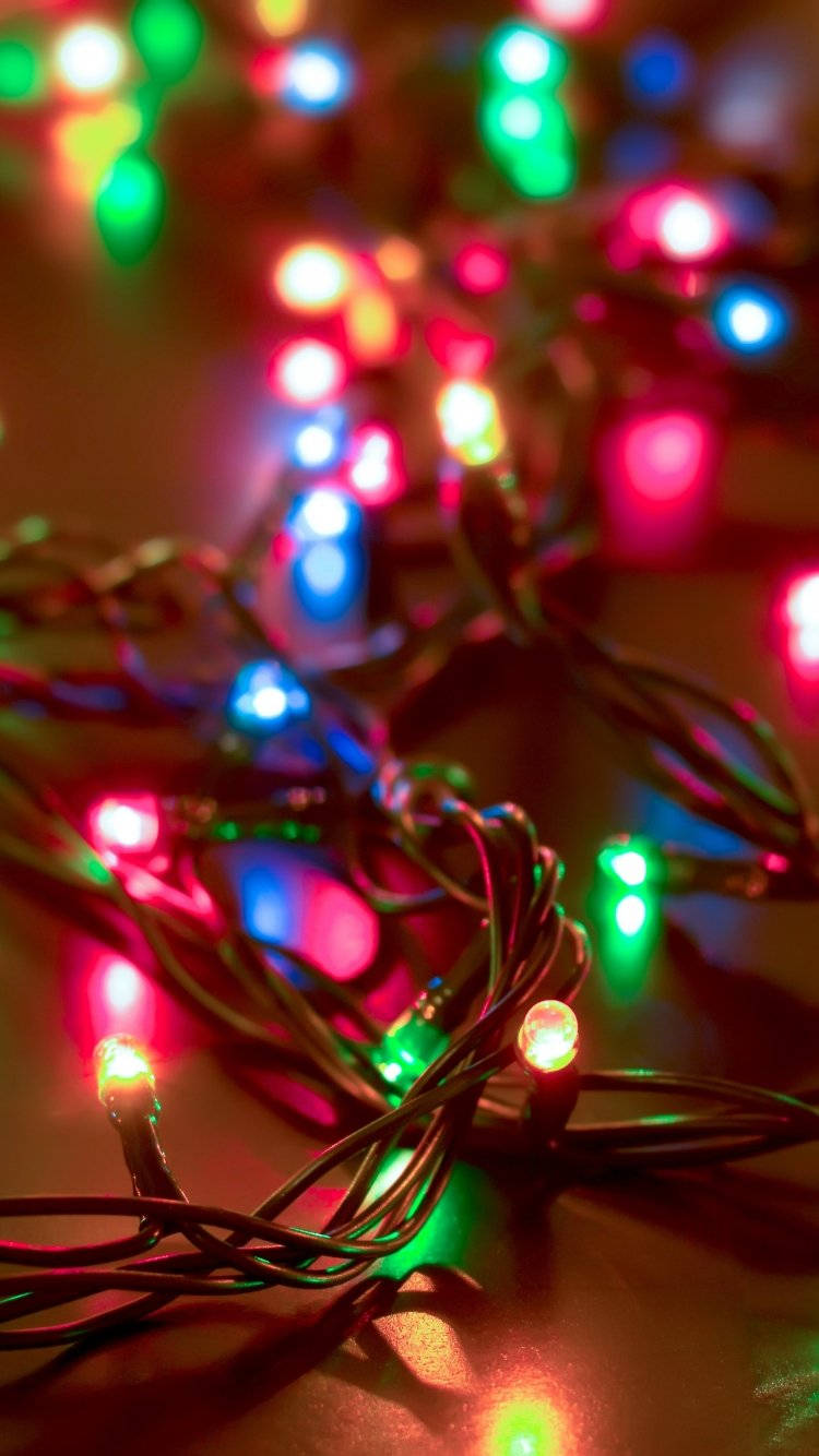 Deck the halls with dazzling Christmas lights! Wallpaper