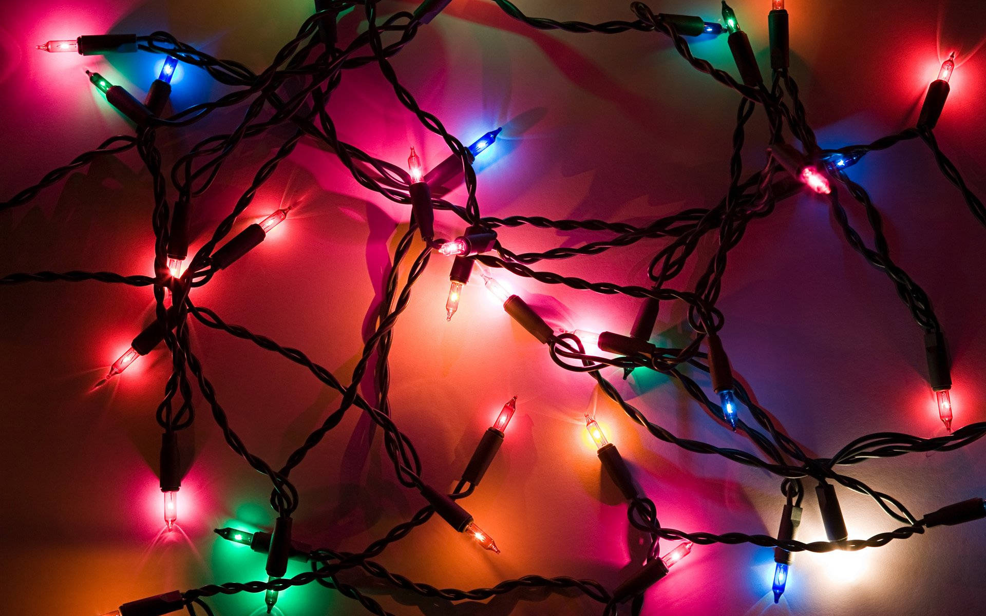 Celebrate the holiday season with a beautiful display of Christmas lights Wallpaper
