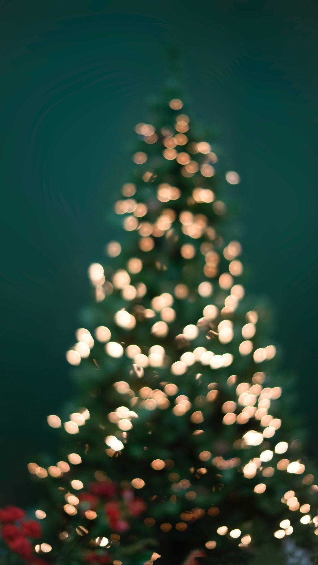Lucesde Navidad En El Árbol Del Iphone Desenfocadas. Fondo de pantalla