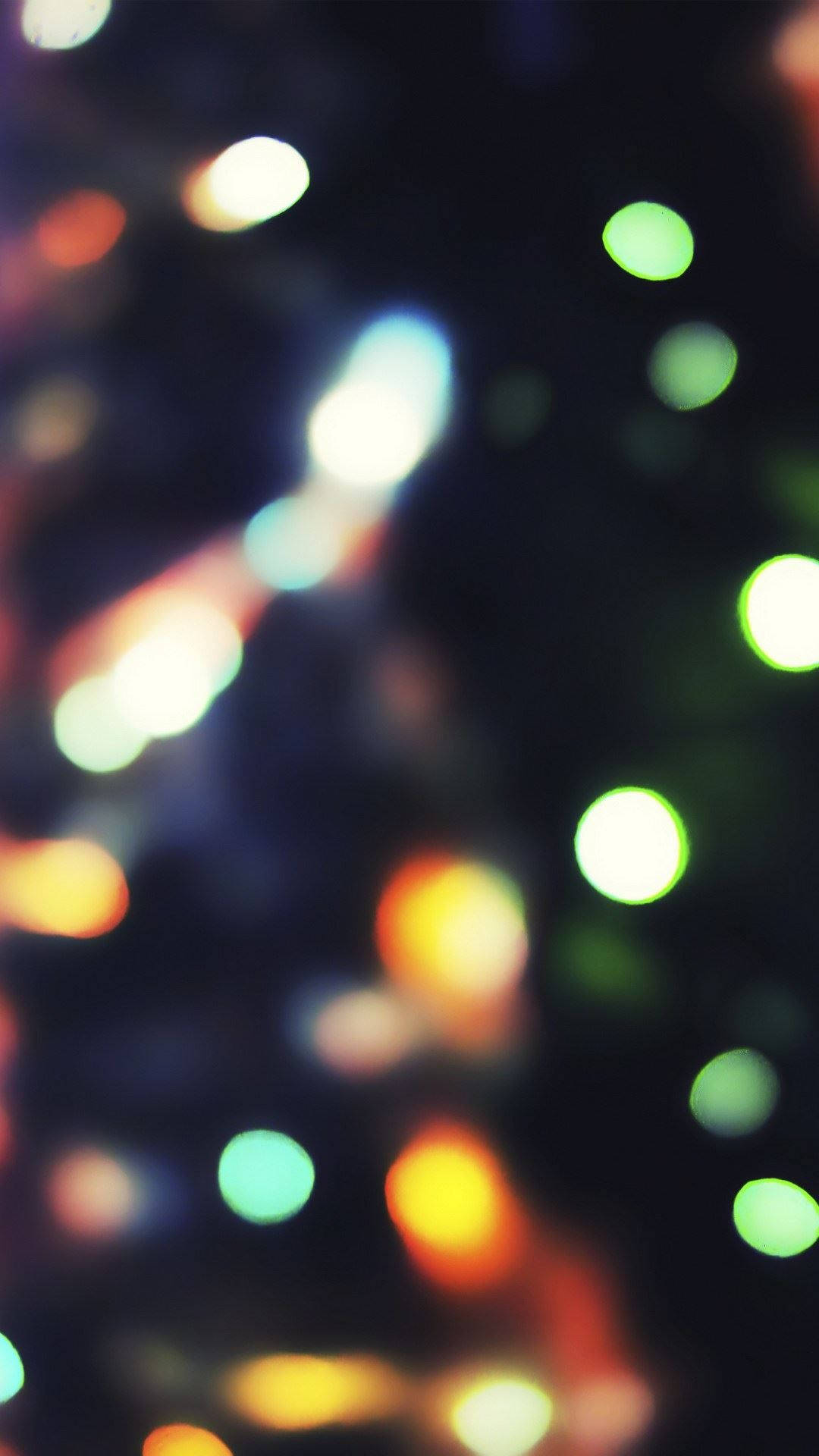 Illuminate the Holidays with this Festive Christmas Lights iPhone Wallpaper Wallpaper