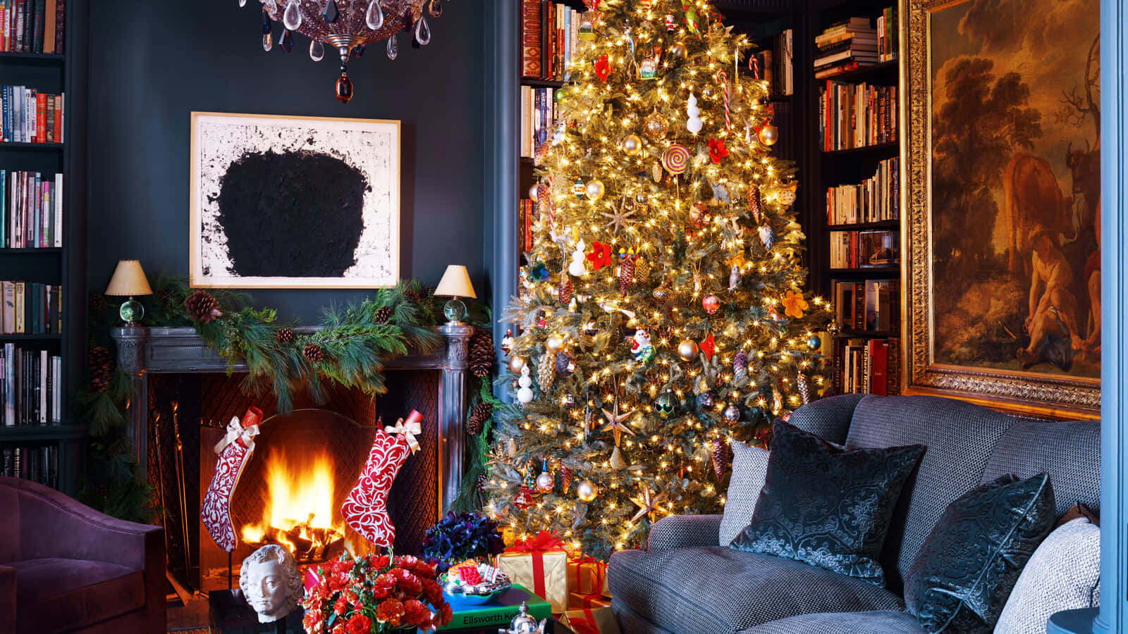 A Living Room With A Christmas Tree And Bookshelves