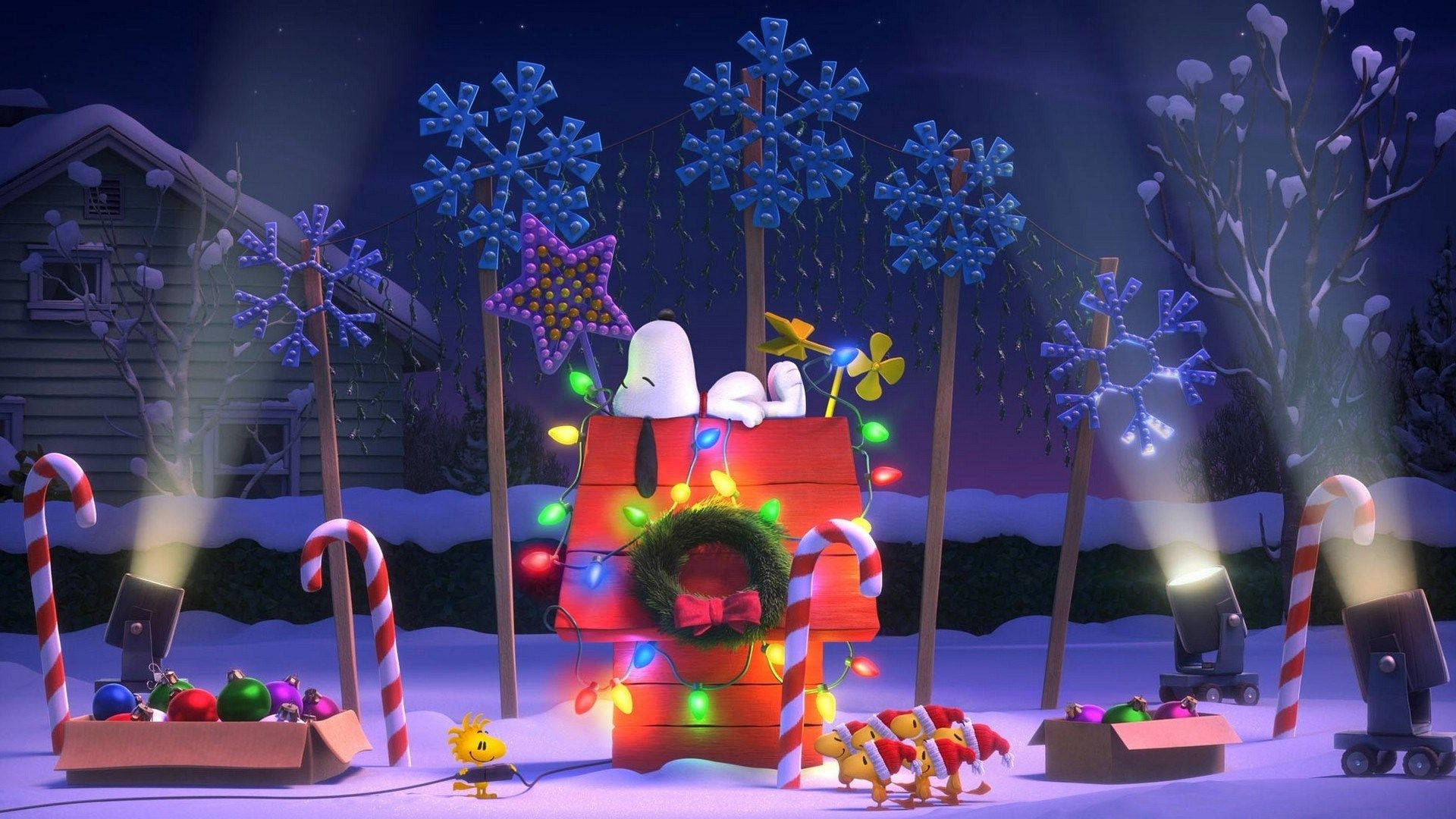 Snoopy's julelys bringer liv til enhver skrivebord. Wallpaper