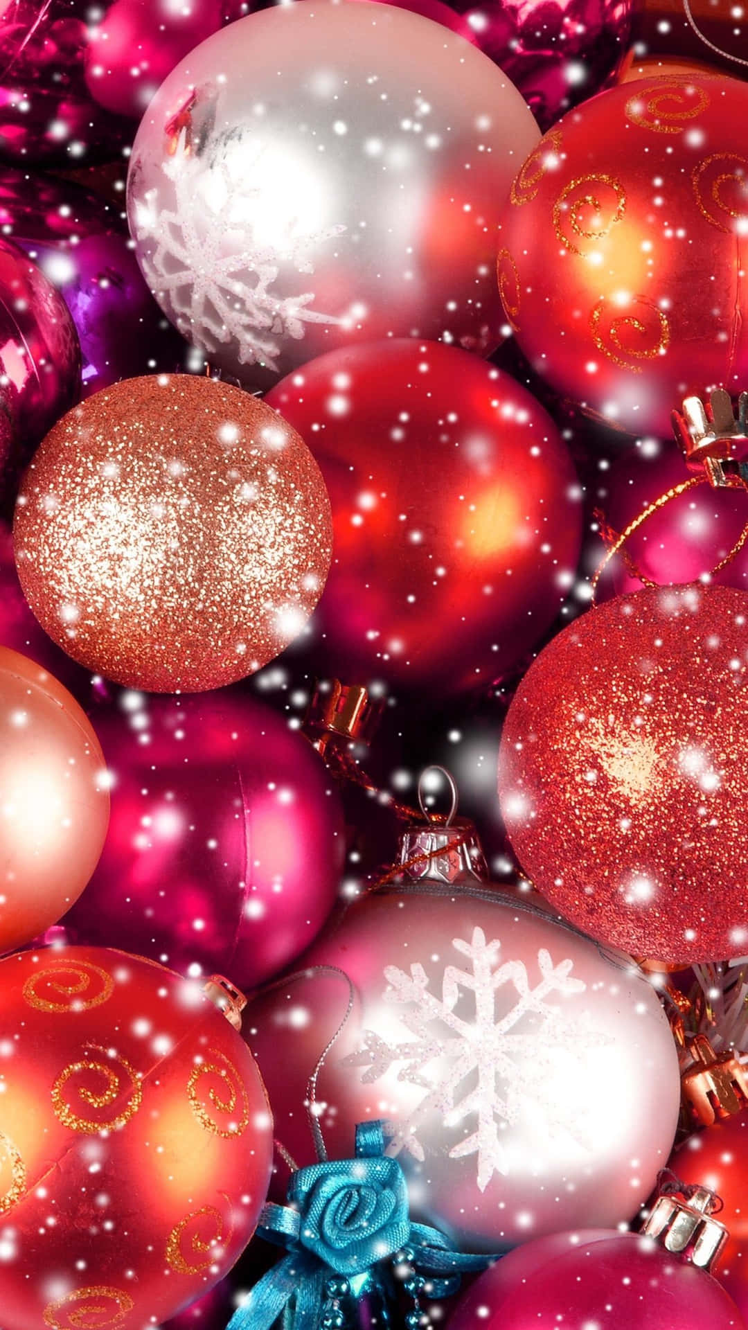 Christmas Ornaments In A Snowy Background Wallpaper