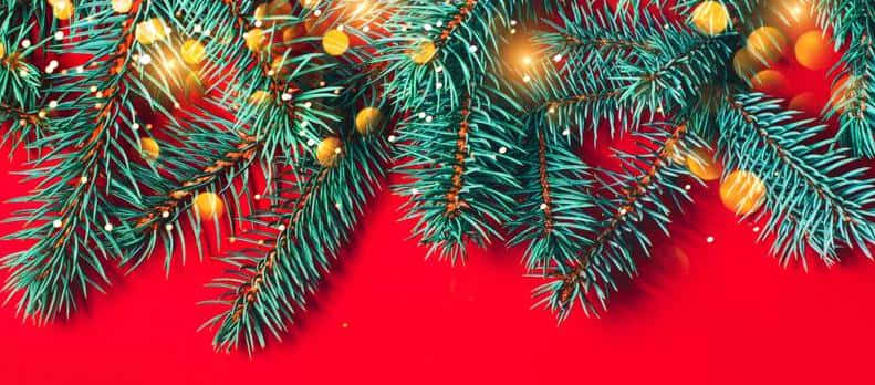 Illuminated and vibrant Christmas red background