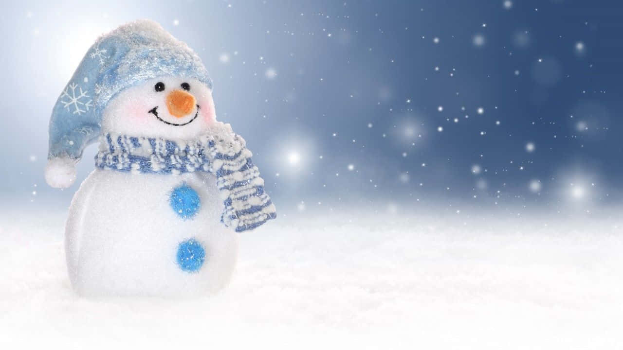 A traditional winter snowman standing tall and proud, ready for Christmas. Wallpaper
