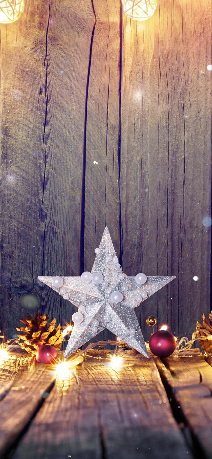 A Glistening Christmas Star Lighting The Way Wallpaper
